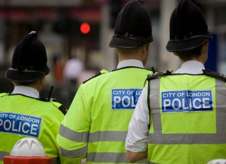 Two teenagers charged in connection with investigation into hacking group, says City of London police